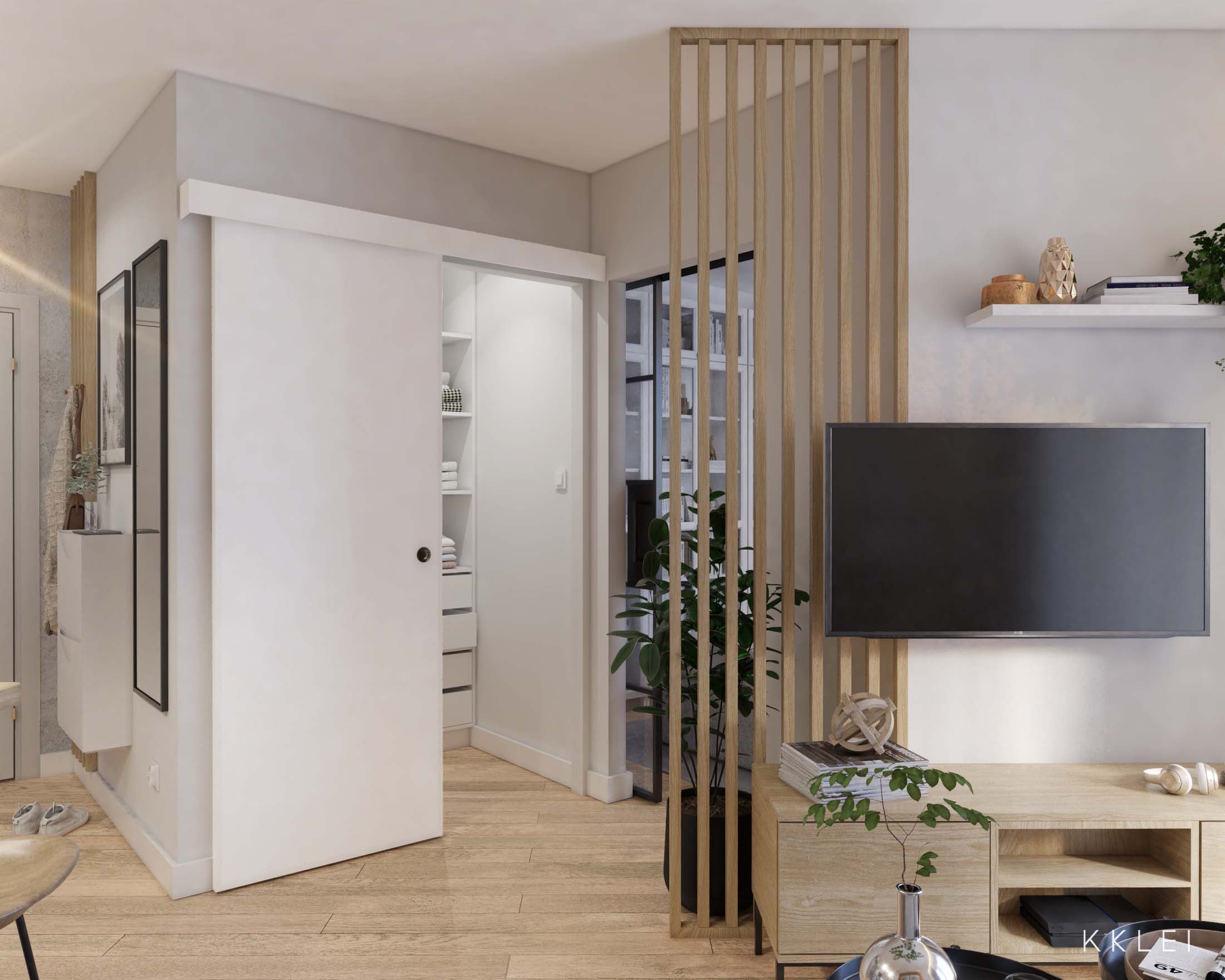 Kompaktowe wnętrze w industrialnym stylu, aneks kuchenny i ceglana ściana