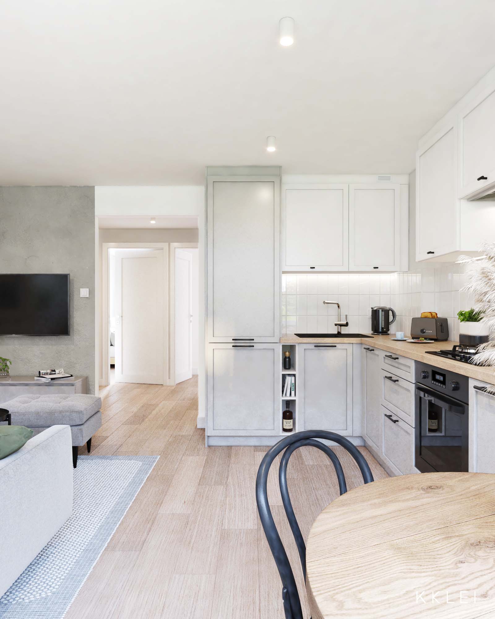 Aranżacja mieszkania w kamienicy, kuchnia przeniesiona do salonu, jasne kolory